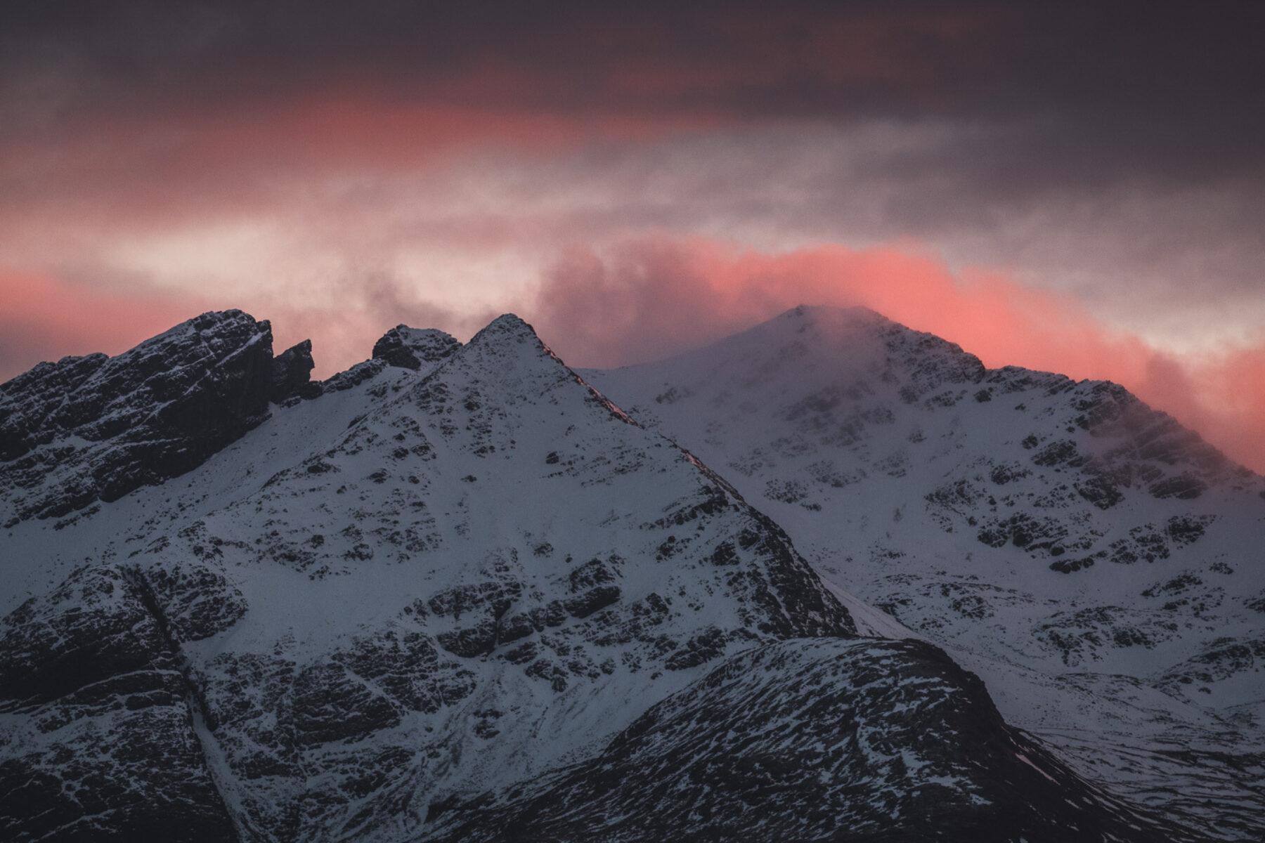 In the Black Cuillin mountains, Skye at sunset. A dusting of snow