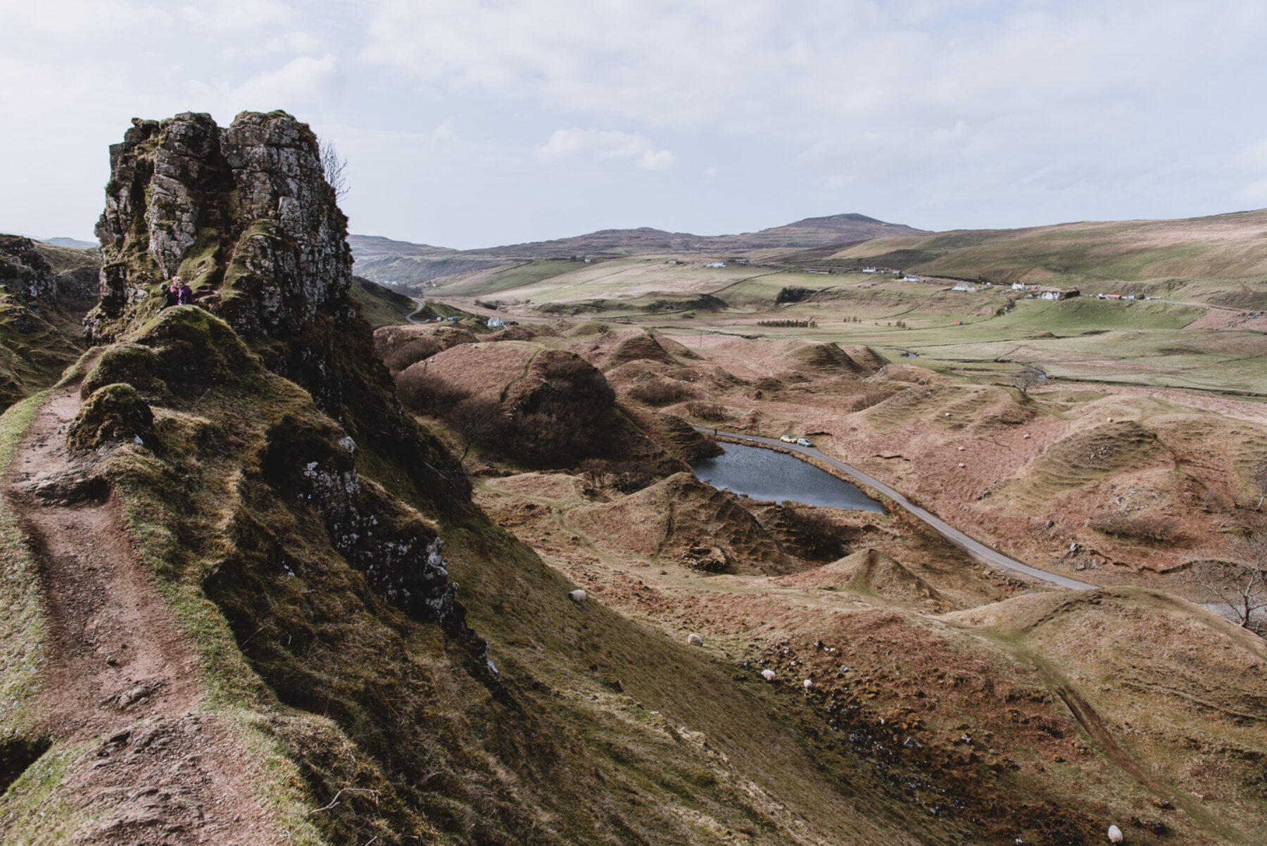 Dramatic landscape on the Isle of Skye, Scotland with rock formations and high sheep path.